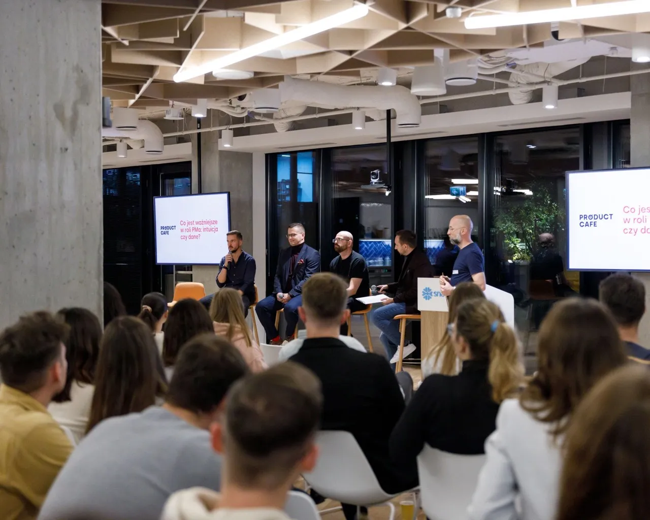Olek on a product panel at a Product Café meetup